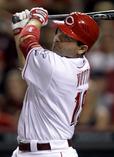 Cincinnati’s Joey Votto drove in five runs against Baltimore on Saturday. (Associated Press)
