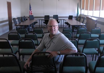 Millwood Mayor Dan Mork sits in the newly remodeled City Council chambers Thursday. The city will hold an open house on Monday  to celebrate the finished project. Mork served as a city councilman for 24 years before being elected  mayor in 2005. His term is up this summer, and he plans to run for reelection.  (J. BART RAYNIAK / The Spokesman-Review)
