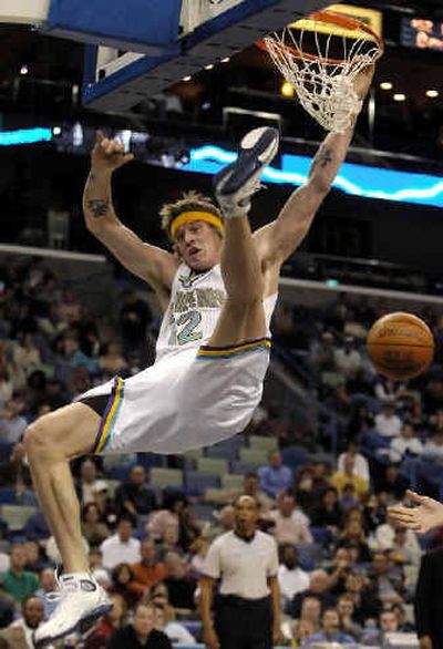 
Chris Andersen of the New Orleans Hornets dunks during the first half against Sacramento. 
 (Associated Press / The Spokesman-Review)
