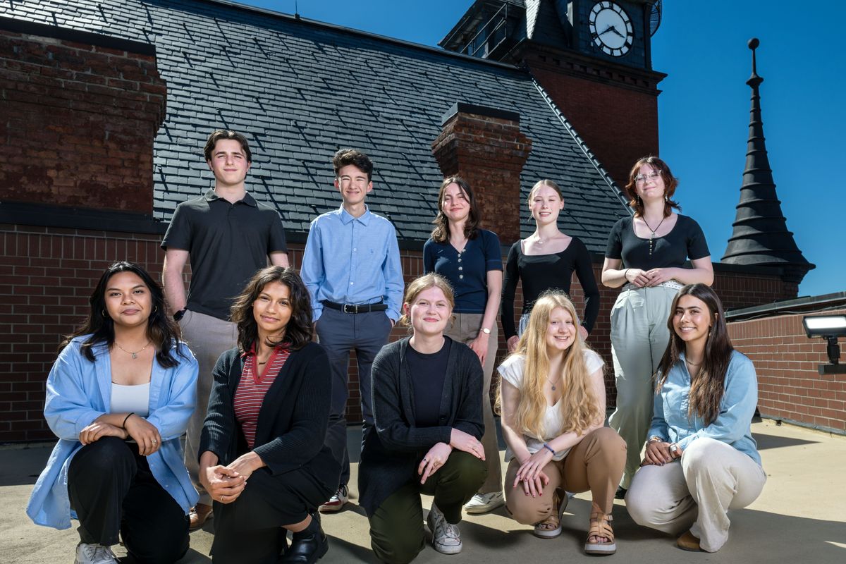 The 2024 Teen Journalism Institute class poses for a photo on the rooftop of The Spokesman-Review Tuesday. From left, bottom row, are Hazel Guieb, Z’hanie Weaver, Claire Lyle, Laura Sheikh and Olive Pete. In the top row are Marton Mezei, Troy Slack, Caroline Saint James, Sofia Hessler and Virginia Carr.  (COLIN MULVANY/THE SPOKESMAN-REVIEW)