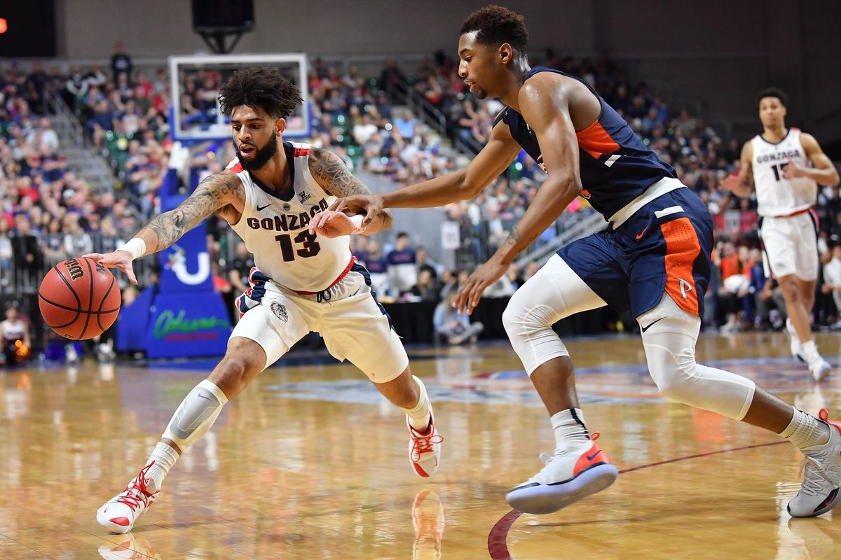 Gonzaga Bulldogs guard Josh Perkins (13) moves the ball up the court against the Pepperdine Waves during the second half of a WCC Men