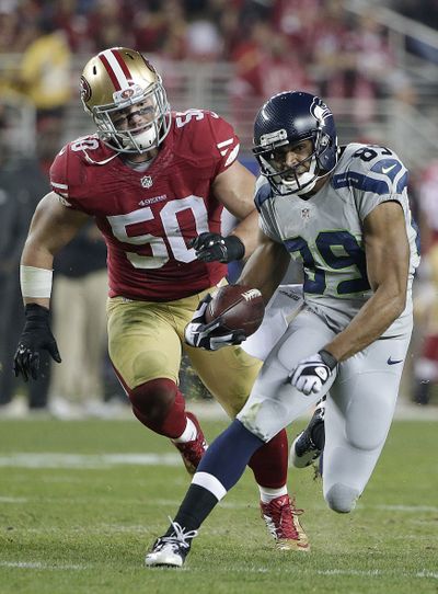 Doug Baldwin, chased by Chris Borland in last game with 49ers, says teams have mutual respect. (Associated Press)