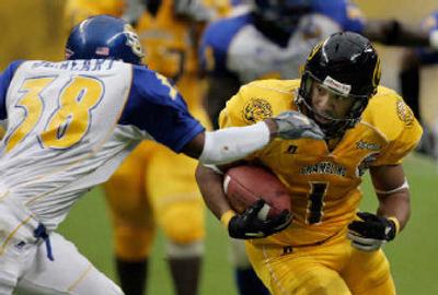 
Southern's Denard Duheart (38) reaches to stop Grambling State receiver Cornelius Mackey last year in Houston. 
 (Associated Press / The Spokesman-Review)