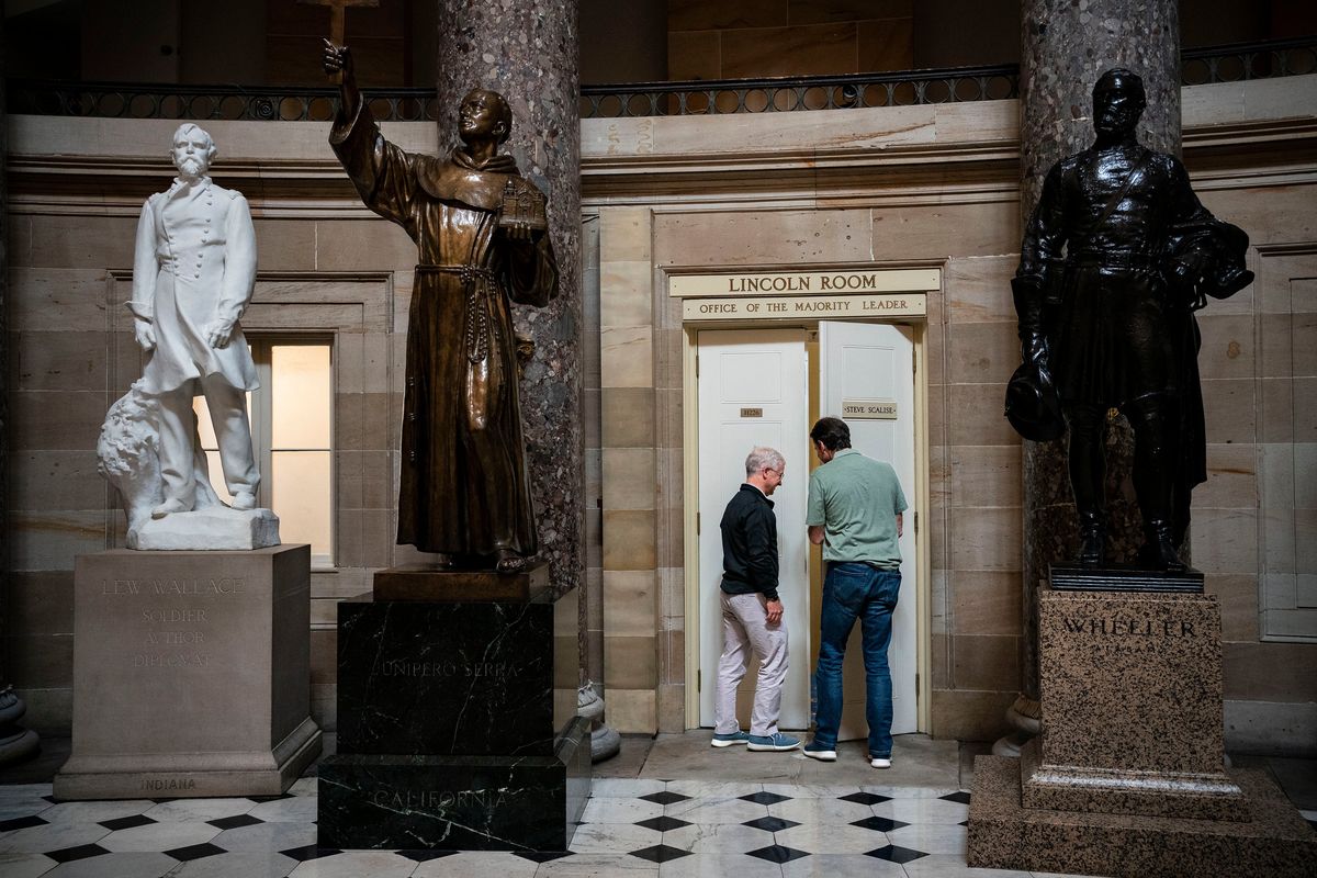 Reps. Patrick McHenry (R-N.C.), left, and Garret Graves (R-La.) enter the office of House Majority Leader Steve Scalise (R-La.) at the Capitol in Washington on Sunday, May 28, 2023. (Haiyun Jiang/The New York Times)  (HAIYUN JIANG)