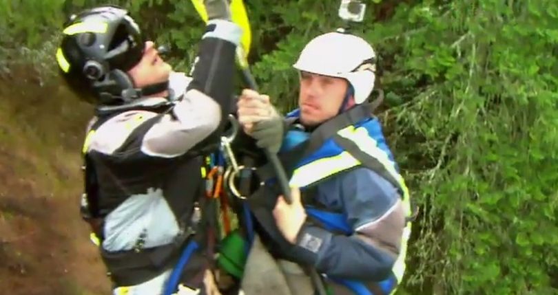 Kayaker Jonathan Wyble, right, is rescued by a Two Bear Air helicopter crew from an accident on the Potlatch River on March 12, 2016. Wyble was later arrested when Latah County Sheriff's deputies learned he was wanted on felony charges. (Two Bear Air)