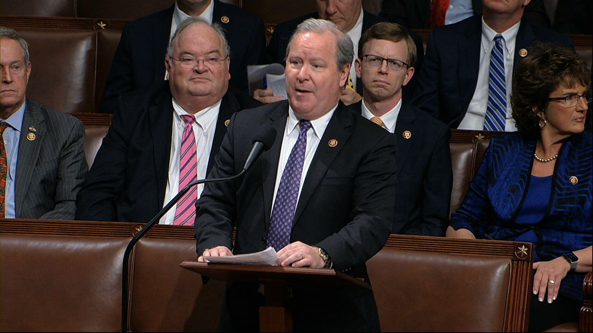 In this Dec. 18, 2019 photo, Rep. Larry Bucshon, R-Ind., speaks on the House floor at the Capitol in Washington. With vaccination rates lagging in red states, Republican leaders have begun stepping up efforts to persuade their supporters to get the shot, at times combating misinformation spread by some of their own.  (HOGP)