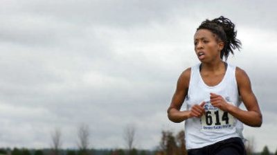 
Senior Anna Layman placed third in the District 8 4A race last Saturday and will contend at state for the first time since her freshman year.
 (Kathryn Stevens / The Spokesman-Review)