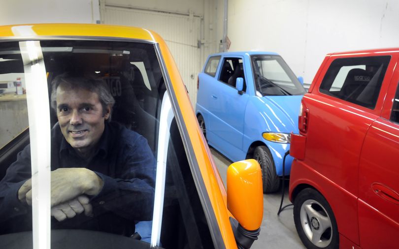 Rick Woodbury sits in a Tango electric car at his E. Sprague shop where he builds the high-performance commuter cars Tuesday, Dec. 22, 2009. He's had an eventful year that included finishing cars for the Google founders and his car competing for the automotive Xprize.  He is sitting in one of Sergey Brin's three Tangos. (Jesse Tinsley / The Spokesman-Review)