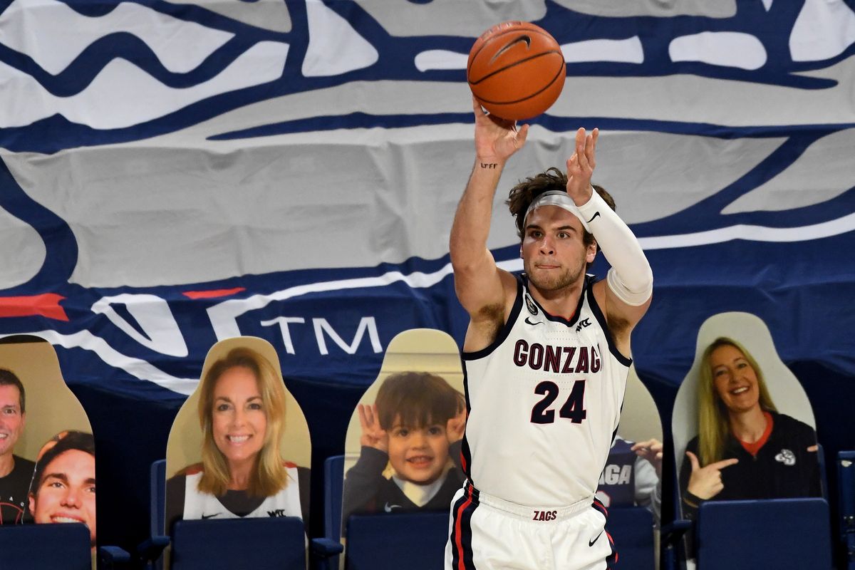 Gonzaga Bulldogs forward Corey Kispert (24) hits a shot from 3-point range during the first half of an NCAA college basketball game, Thurs., Jan. 14, 2021, in the McCarthey Athletic Center.  (Colin Mulvany/THE SPOKESMAN-REVIEW)