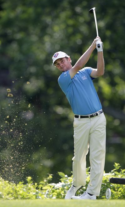Spencer Levin hits his tee shot on the 18th hole during the third round of the Memorial golf tournament on Saturday in Dublin, Ohio. (Associated Press)