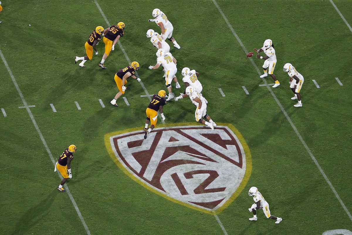 FILE - In this Aug. 29, 2019, file photo, is the Pac-12 logo during the second half of an NCAA college football game between Arizona State and Kent State, in Tempe, Ariz. The return of football isn