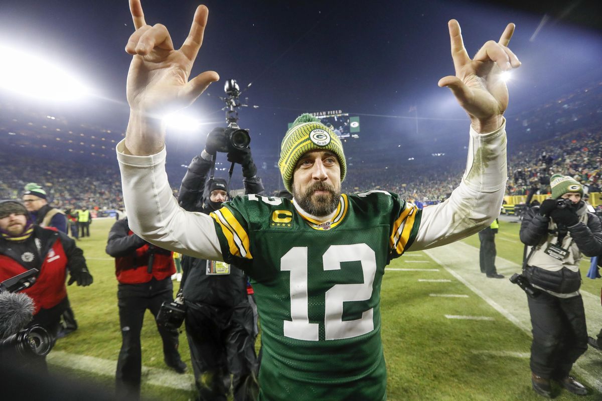 Green Bay quarterback Aaron Rodgers and the Packers are headed to their third NFC Championship game in the past six years. (Mike Roemer / AP)