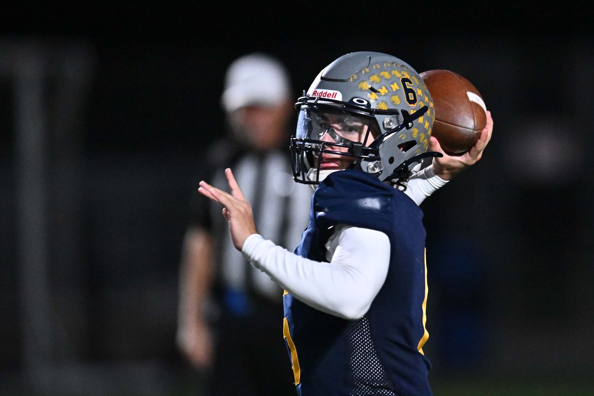 Mead Panthers Landon Thomas (6) throws a pass against the Ferris Saxons in the first half of a high school football game on Thursday, Oct. 2, 2025 at Union Stadium Spokane, WA.  (James Snook)
