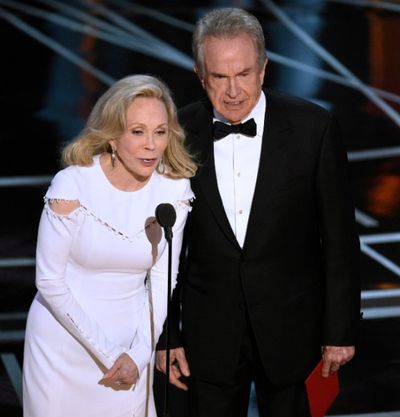 Faye Dunaway, left, and Warren Beatty present the award for best picture at the Oscars on Sunday at the Dolby Theatre in Los Angeles. Dunaway mistakenly read 