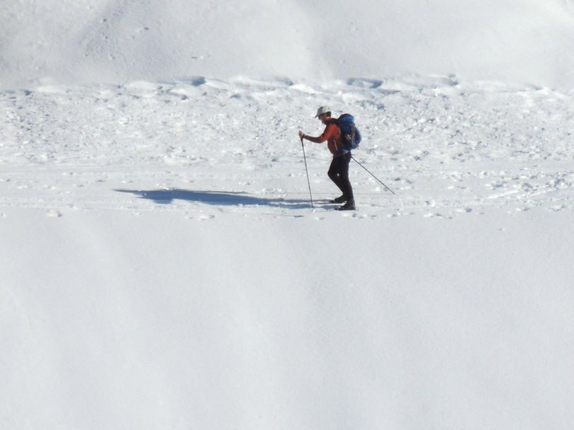 In this photo taken in November 2015, a man snowshoes on the Paradise Valley Road at Mount Rainier National Park in Washington. (Jeffrey Mayor / The News Tribune)