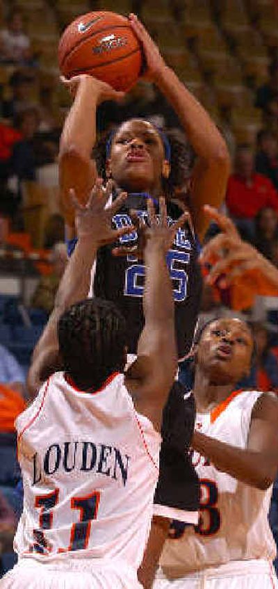 
Duke's Monique Currie shoots over Auburn's Nicole Louden.
 (Associated Press / The Spokesman-Review)