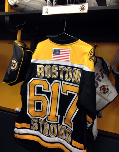 A Bruins “Boston Strong” jersey bears the city’s area code. (Associated Press)