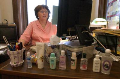 
Legislative assistant Ruthie Zimmer keeps a supply of hand sanitizers, vitamins and medications at her desk to help visitors and co-workers ward off wintertime ailments. 
 (Richard Roesler / The Spokesman-Review)