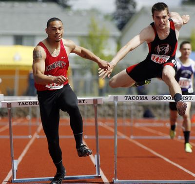 Cheney's Diondre Moore-Young, left, finished 2nd to Mt. Baker's Logan Packard, right, by .02 seconds. (Patrick Hagerty)
