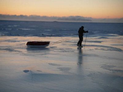 
Briton Karl Bushby walks along the frozen Bering Sea earlier this year. Russian authorities have detained Bushby and Dimitry Kieffer of Anchorage, Alaska, after the pair crossed a frozen 56-mile stretch of the Bering Strait on foot. 
 (Associated Press / The Spokesman-Review)
