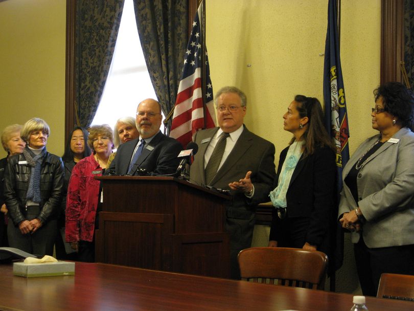 House Minority Leader John Rusche, D-Lewiston, speaks as House and Senate Democrats give their response to GOP Gov. Butch Otter's State of the State message. (Betsy Russell)