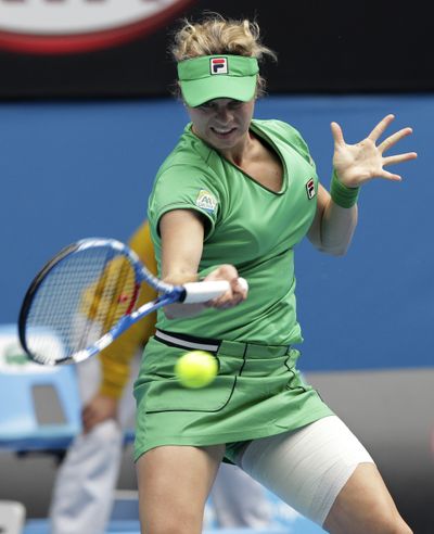 Kim Clijsters makes a forehand return to Agnieszka Radwanska during their quarterfinal match. (Associated Press)