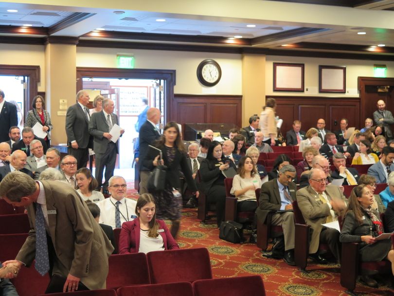 Idaho legislators file into the Lincoln  Auditorium for mandatory 