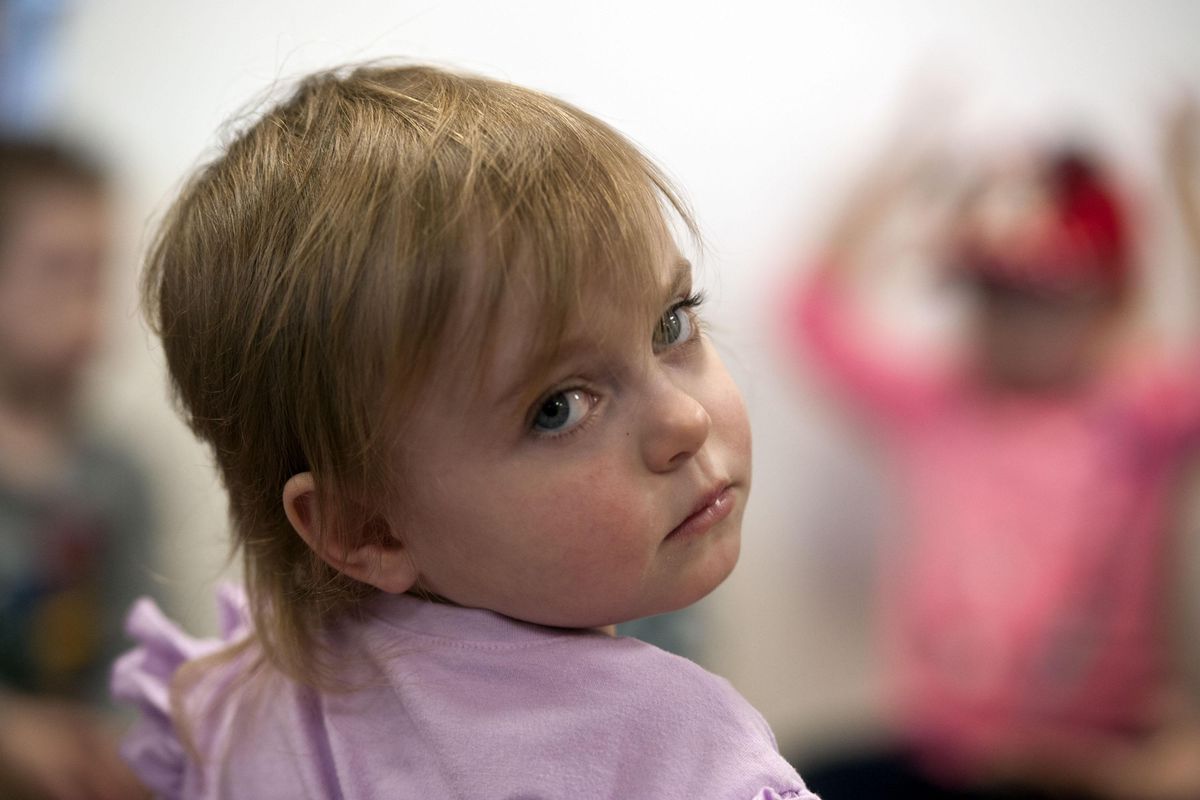 Iceland Cool, 2, listens to music at Joya Children & Family Developement in Spokane on Wednesday, April 10, 2019. Joya was formerly the Spokane Guilds' School & Neuromucsular Center. (Kathy Plonka / The Spokesman-Review)
