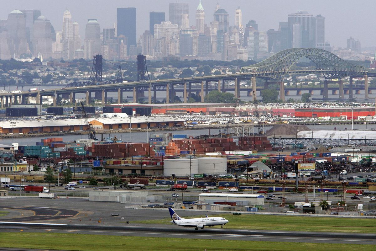 This June 30, 2008 photo shows the Casicano Memorial Bridge at center and the Manhattan, New York skyline in the background as a passenger airplane lands at Newark Liberty International Airport in Newark, N.J. Improving the nations roads and bridges would require $120 billion a year through 2020, according to a recent U.S. Department of Transportation estimate. But annual spending at all levels of government is just $88 billion. And the nation's mass transit systems have over a $90 billion backlog of maintenance and repair needs. (Mel Evans / File/Associated Press)