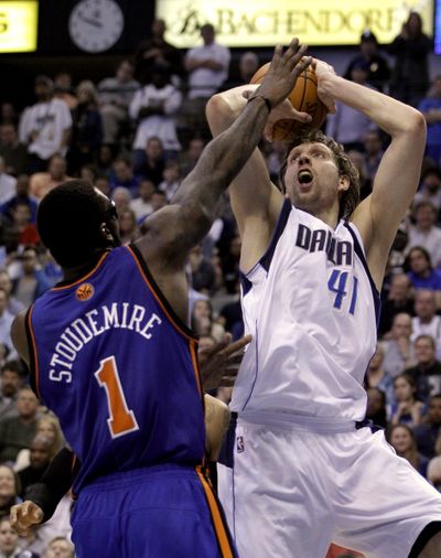 Dirk Nowitzki agreed to play at least 3 more years with Mavericks. (Associated Press)