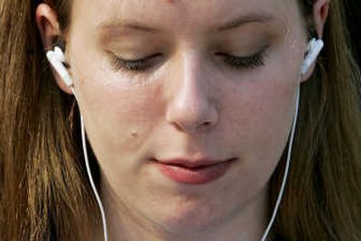 
The iPod is an instrument of solitude, unless the user ignores basic etiquette by invading the eardrums of bystanders. 
 (FILE / The Spokesman-Review)