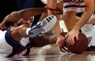 
Erroll Knight scraps for a loose ball during Gonzaga's 85-71 win over Santa Clara on Saturday. The Zags face Saint Mary's tonight. 
 (Brian Plonka / The Spokesman-Review)