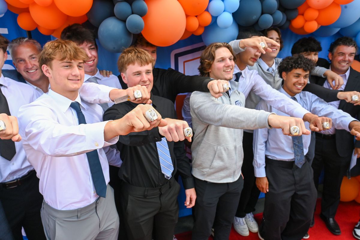 Members of the Gonzaga Prep boys basketball team show off their State 4A championship rings as they walk the red carpet for the 11th annual Spokane Youth Sports Awards on Tuesday at the Martin Woldson Theater at the Fox in Spokane. (DAN PELLE/FOR THESPOKESMN-REVIEW)