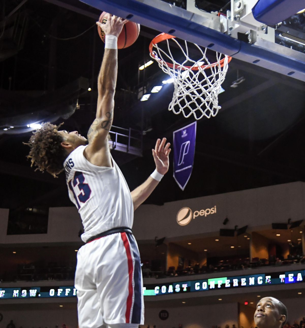 Gonzaga guard Josh Perkins attempts a dunk against San Francisco, Monday, March 5, 2018, at the Orleans Arena in Las Vegas . (Dan Pelle / The Spokesman-Review)