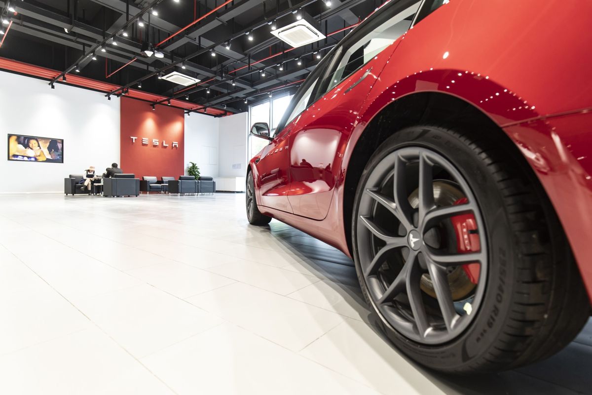 A Tesla electric vehicle sits in a showroom in Shanghaion October 16.  (Qilai Shen/Bloomberg)