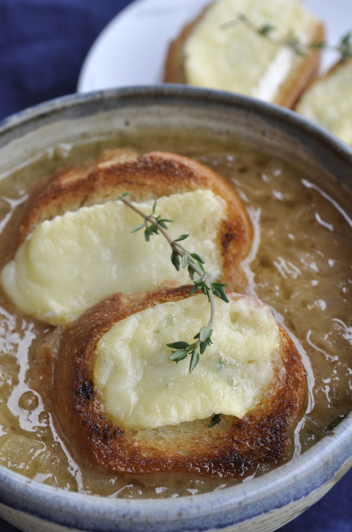 Recipes from some of the more wintry regions of Europe and North America – like this Normandy- style Onion and Cider Soup with Melting Camembert – fill Diana Henry’s newly updated “Roast Figs Sugar Snow,” re-released in September. (Adriana Janovich)