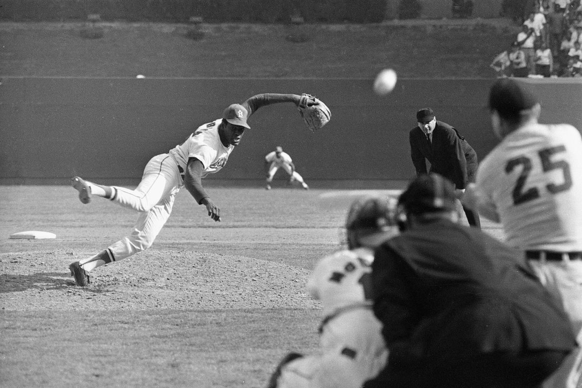 In this Oct. 2, 1968 photo, St. Louis Cardinals ace pitcher Bob Gibson throws to Detroit Tigers