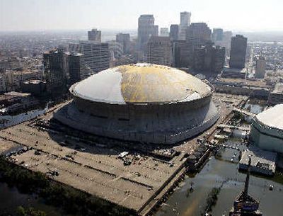 
The Louisiana Superdome is surrounded by floodwaters from Hurricane Katrina on Wednesday in New Orleans. 
 (Associated Press / The Spokesman-Review)