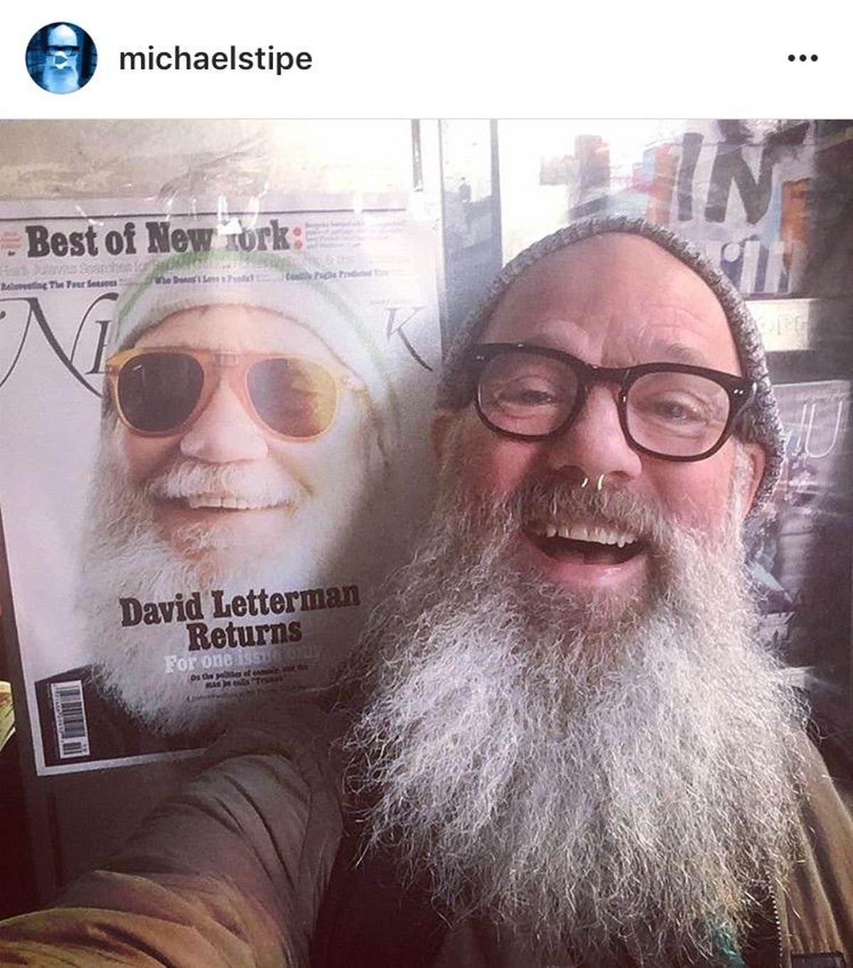 Former R.E.M. singer Michael Stipe posted this image on Tuesday of himself posting with a magazine image of David Letterman.