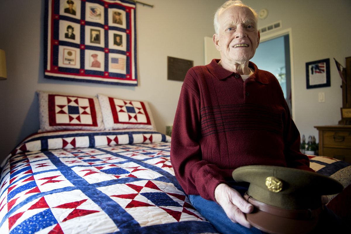 World War II veteran Peter D. Bang poses for a photo at his home on Thursday, May 12, 2016, in Spokane Valley, Wash. Five siblings in the Bang family from Spokane served in World War II. Two were killed. (Tyler Tjomsland / The Spokesman-Review)