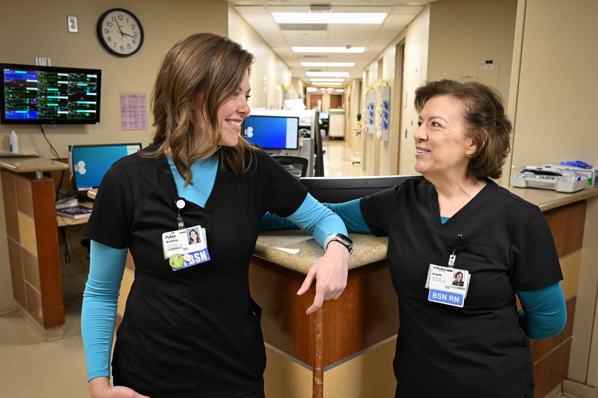 Brittany Payton, left, and her mother, Angela Korver, are veteran nurses at MultiCare Deaconess Medical Center. Korver went back to college at 45, partly to motivate her young daughter to continue her nursing education, even though she wasn’t interested in the field. (Jesse Tinsley / The Spokesman-Review)