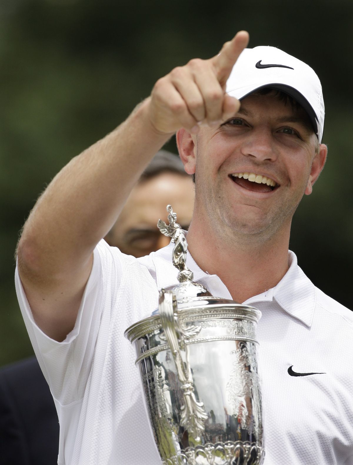 Lucas Glover holds his trophy after winning the U.S. Open on Monday. (Associated Press / The Spokesman-Review)