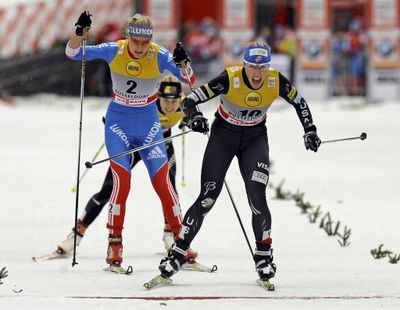  Kikkan Randall of the USA, right, wins the Free Sprint Final in front of second placed Natalia Matveeva of Russia, left, during the Cross Country World Cup in Duesseldorf, Germany, Saturday, Dec. 3, 2011. The next day, she finished second in the sprint relay, teaming with Sadie Bjornsen of Winthrop. The World Cup is held on artificial snow in the heart of the western German city of Duesseldorf, close to the river Rhine. (Associated Press)
