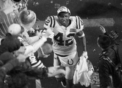 
Former WSU Cougar Jason David of the Colts celebrates with fans. 
 (Associated Press / The Spokesman-Review)