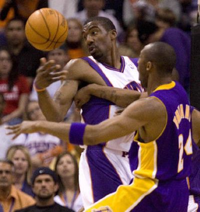 
Suns' Amare Stoudemire, left, and Lakers' Kobe Bryant battle for a loose ball during Wednesday's Game 5 at Phoenix.  
 (Associated Press / The Spokesman-Review)