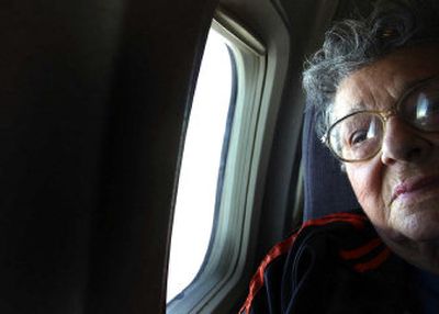 
Rosemary Campo, 78, settles into a plane ride on Saturday, returning to her native New Orleans after fleeing Hurricane Katrina to her son's home in Newman Lake several weeks earlier. 
 (Brian Plonka / The Spokesman-Review)