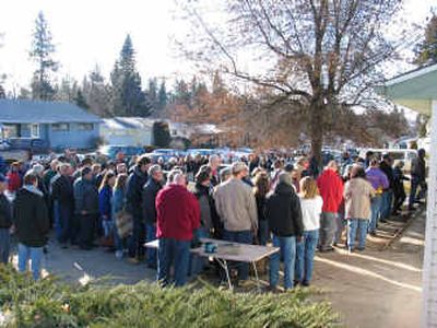 
More than 100 people lined up to shop at a North Spokane earlier this year. 
 (Cheryl-Anne Millsap photo / The Spokesman-Review)