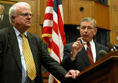 Attorney General John Ashcroft, right, gestures during a news conference with Rep. James Sensenbrenner, R-Wis., on Tuesday. Ashcroft delivered a report on the Patriot Act to members of the House Judiciary Committee.
(Associated Press / The Spokesman-Review)