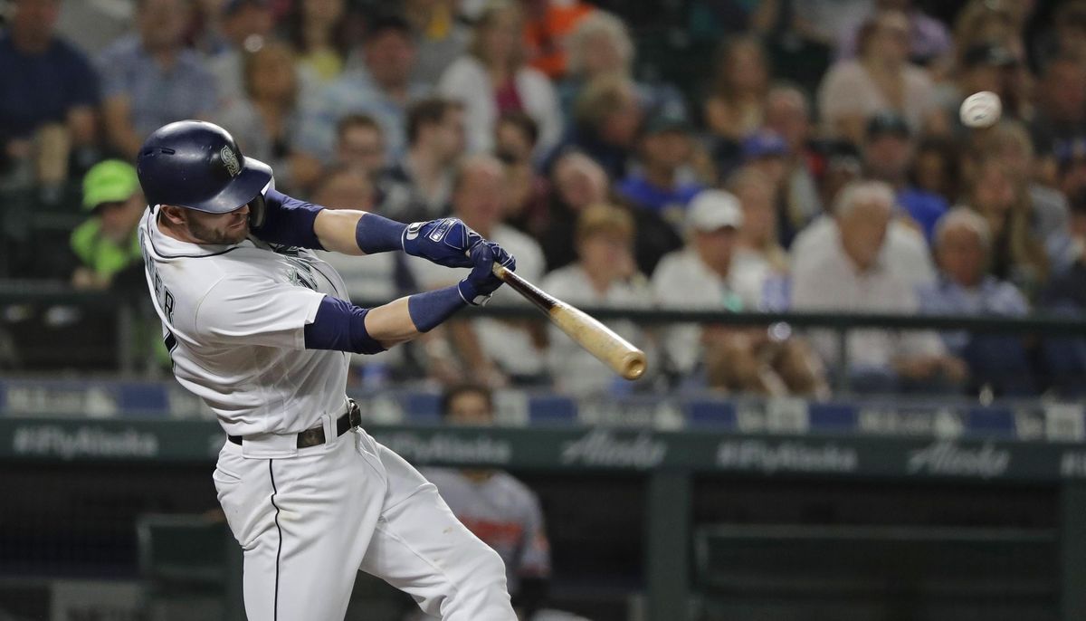 Seattle’s Mitch Haniger hits a solo home run during the third inning against the Baltimore Orioles on Wednesday in Seattle. (Ted S. Warren / AP)