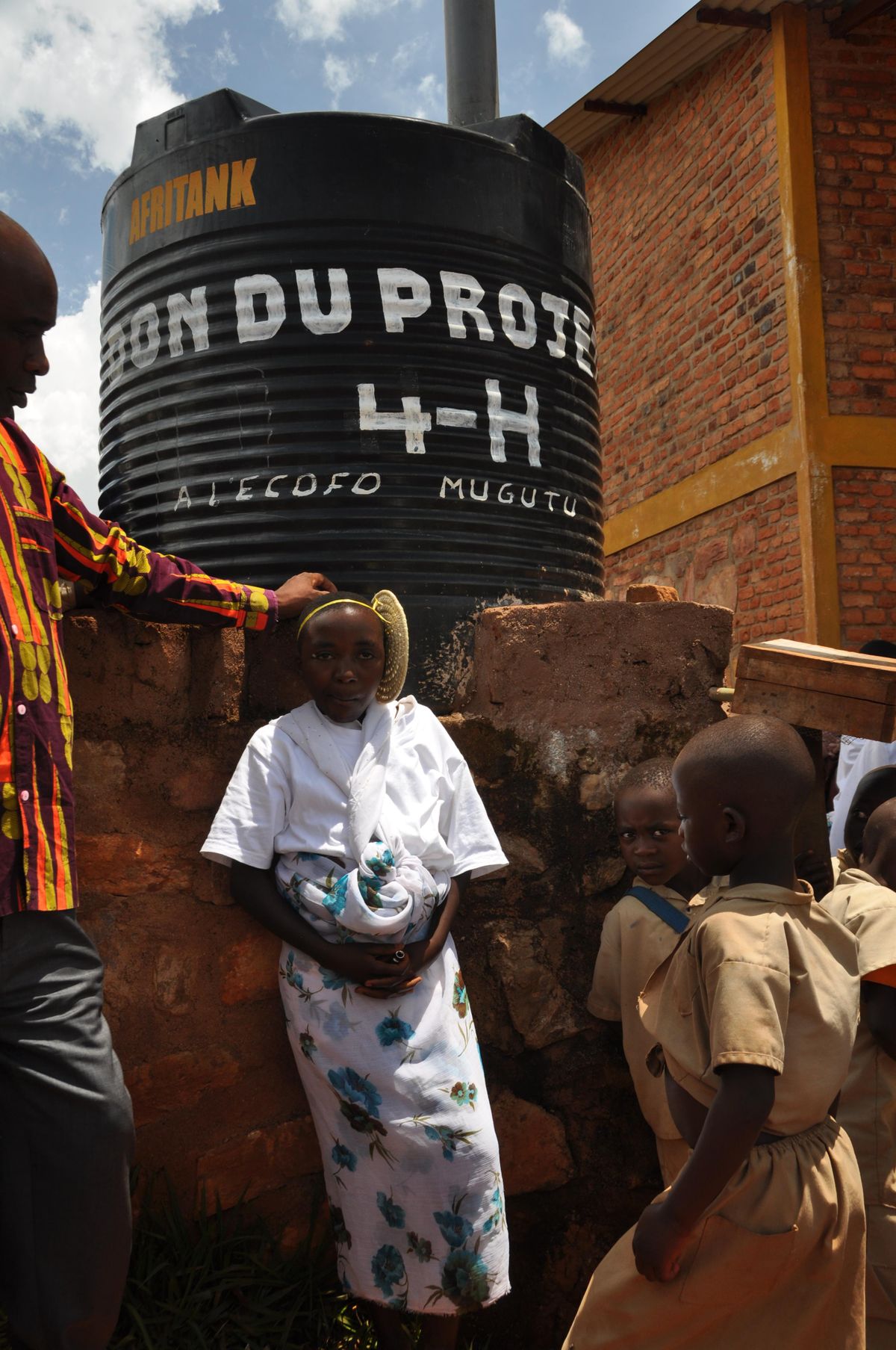 Water catchment tanks capture rain from roof tops and store it for the dry season. Our project funded a tank for each of the schools. Otherwise student would have to haul water from nearby streams. There are no irrigation systems available for agriculture in the country. (Pat Munts / The Spokesman-Review)